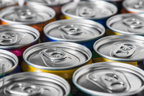 aluminum cans with carbonated water  energy drinks or beer. Background of aluminum cans