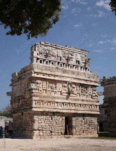 Ancient Mayan ruins the temple with three-dimensional masks of the Maya god of rain chac, at Chichen Itza, Mexico