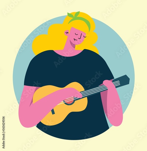 The girl playing little guitar ukulele in the flat style