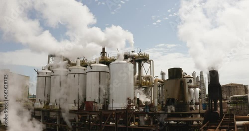 Sugar Cane Refinery / Plant. Beautiful aerial image with the sunlight of the production line of the sugarcane plant - ethanol - Agribusiness. photo