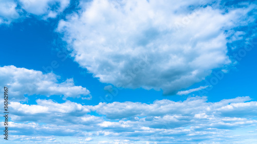 Blue sky with white clouds after a thunderstorm landscape.