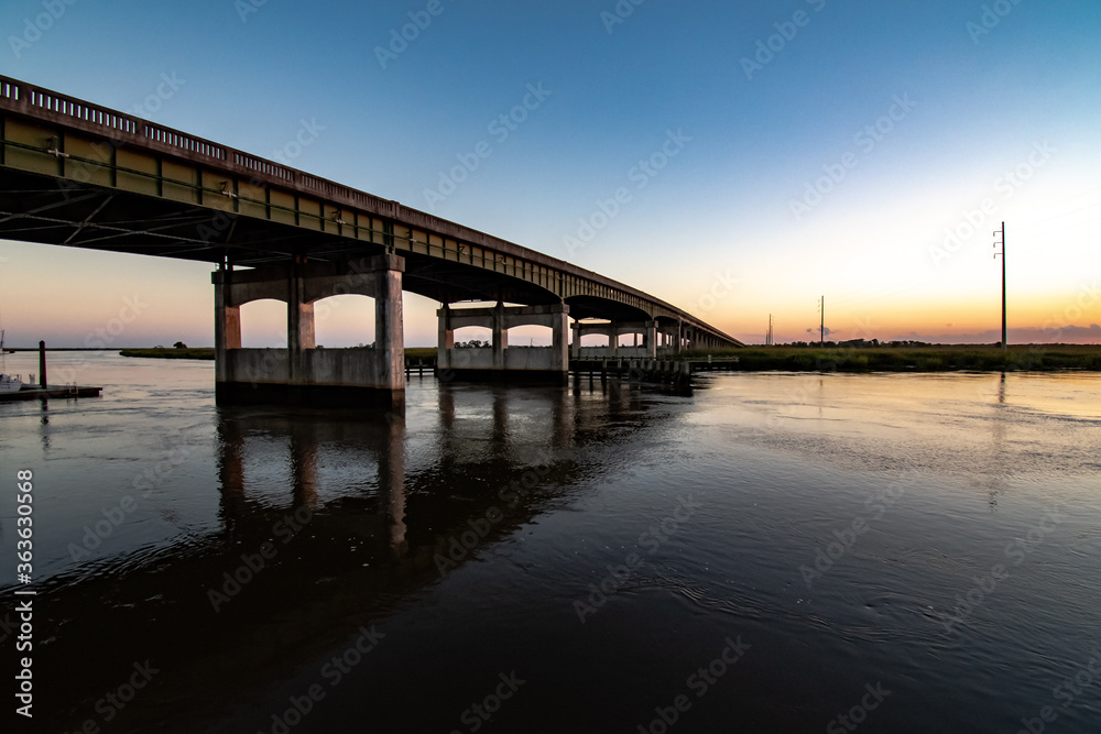Sunset over the US Highway 17 bridge crossing the river at Darien Georgia