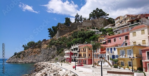 Parga, Greece with the castle and the sea front with colourfull houses and buildings