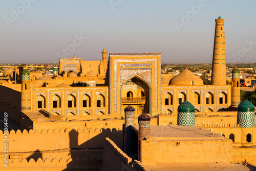 Evening view of Khiva (Chiva, Heva, Xiva, Chiwa, Khiveh) - Xorazm Province - Uzbekistan - Town on the silk road in Central Asia photo