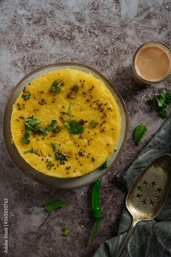 Homemade Dhokla - Steamed svaory cake with chickpea flour, selective focus photo