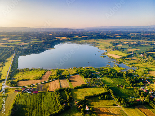 Aerial view of the meadow and the water