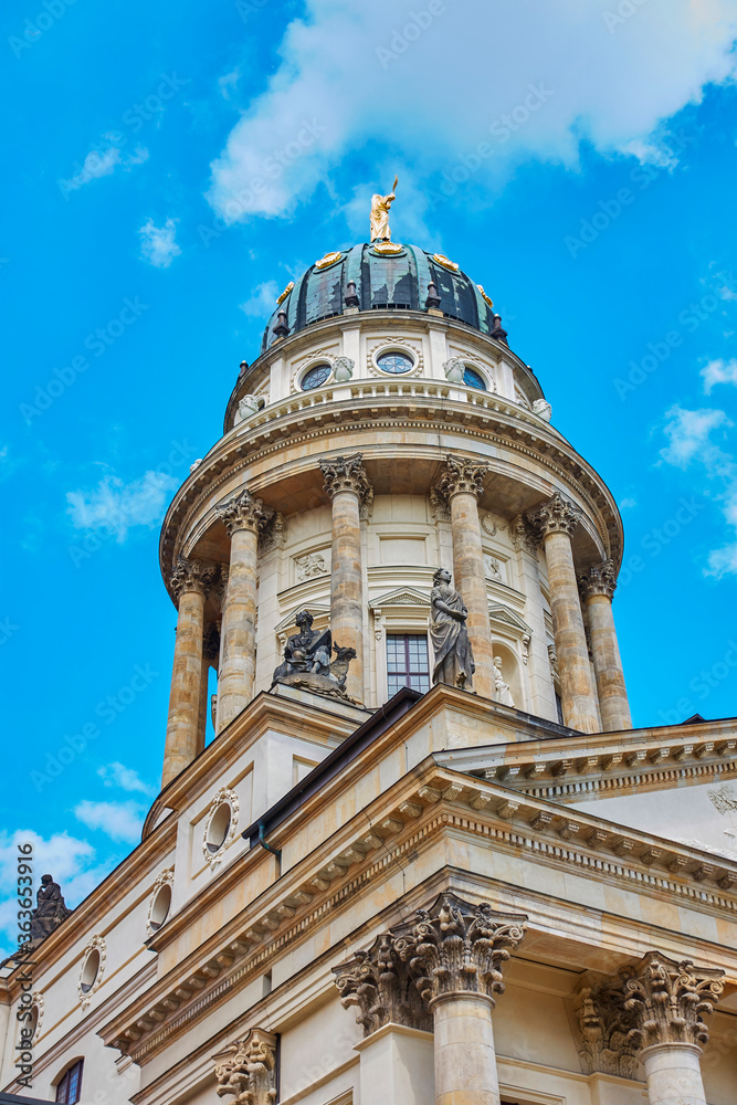 View to a part of the French Cathedral in downtown Berlin at the historic square Gendarmenmarkt.