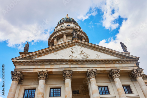 View to a part of the French Cathedral in downtown Berlin at the historic square Gendarmenmarkt.