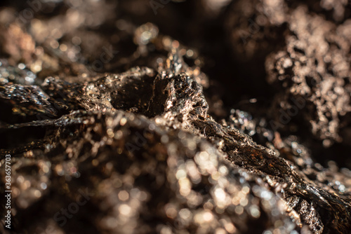 Macro of slag or volcanic magma stone texture  similar to a landscape of a strange space planet