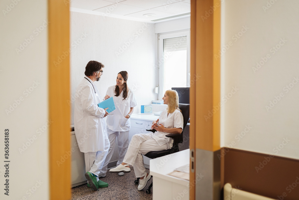 Medical staff in a hospital room Medical staff in a hospital room