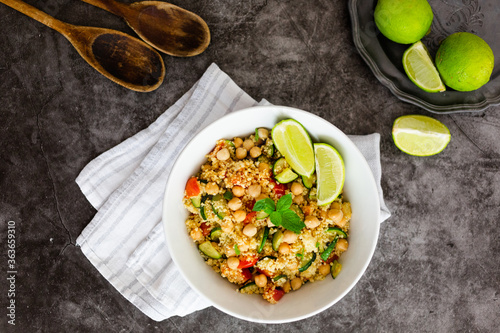 Cous cous with zucchini, lime and chickpeas photo