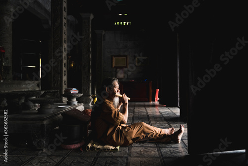 Monk Inside A Temple In Vietnam photo