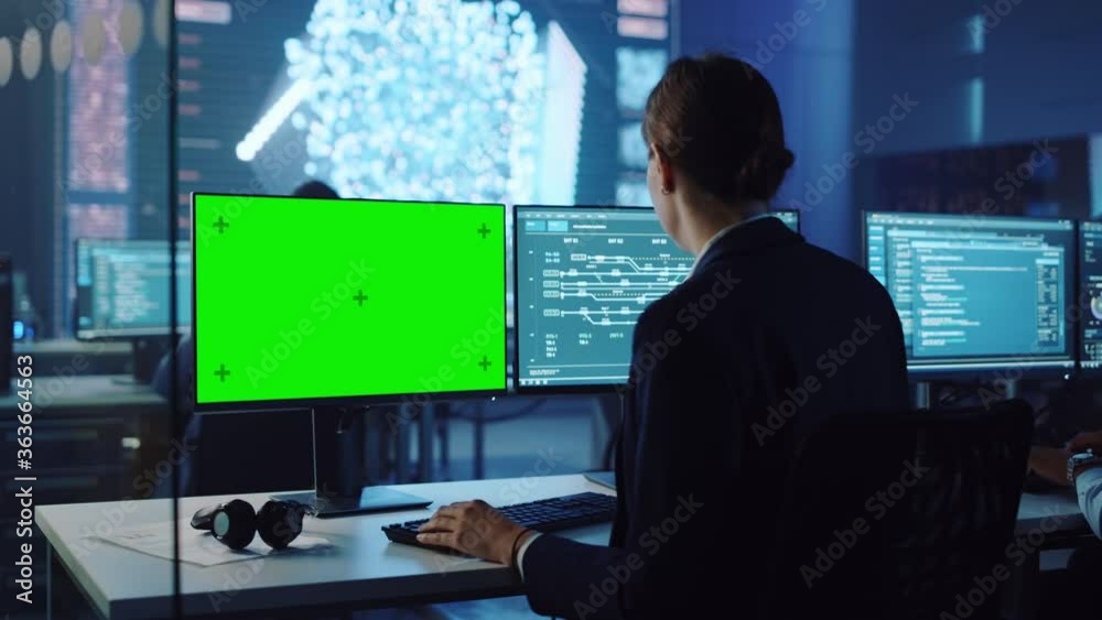 Confident Female Data Scientist Works on Personal Computer with Green ...