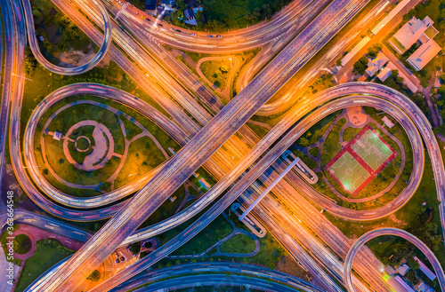 Aerial view footage of car traffic of expressway and intersection in urban. concept or infrastructure and transportation
