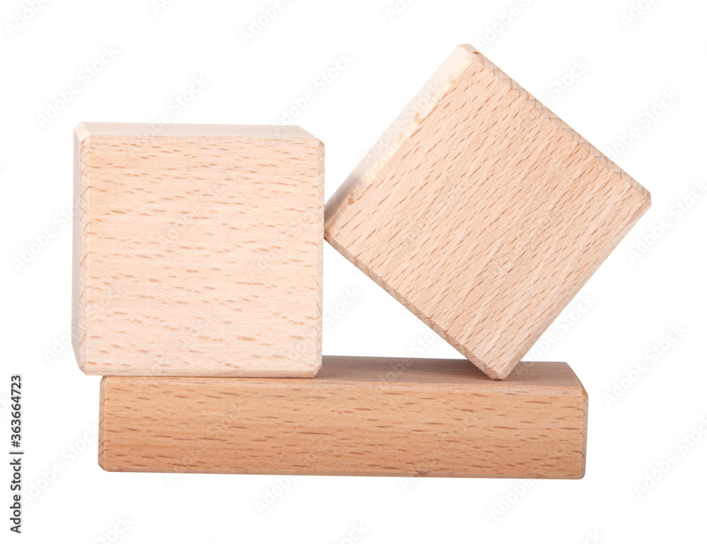 two wooden cubes on one brick create construction isolated on the white