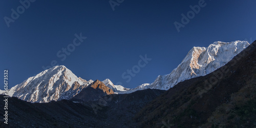 Cheo Himal & Himlung Himal stunning summits on Nepal-Tibet border as seen on descent from Larkya La pass to Bimtang village, Manaslu Circuit trek, Manaslu Himal,  Gorkha district, Nepal Himalaya. © MoVia1