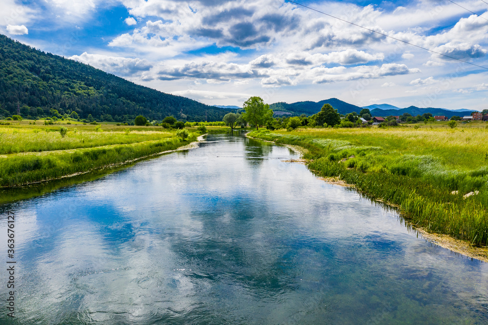 Beautiful nature, colorful Gacka river valley, summer view, Lika region of Croatia Beautiful nature, colorful Gacka river valley, summer view, Lika region of Croatia