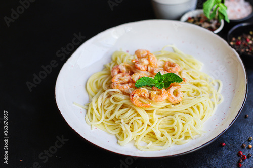 pasta shrimp spaghetti creamy seafood sauce main dish food background top view copy space for text organic healthy eating
