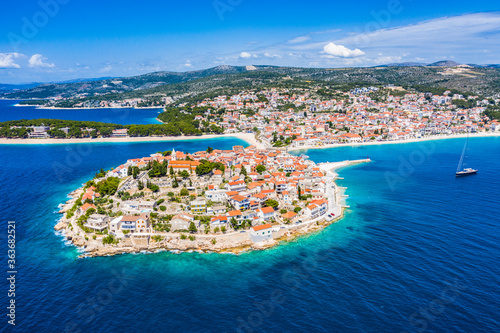 Aerial view of Primosten old town, amazing sunny landscape, Dalmatia, Croatia. Famous tourist resort on Adriatic sea coast.