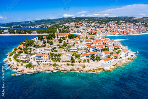 Fototapeta Naklejka Na Ścianę i Meble -  Aerial view of Primosten old town, amazing sunny landscape, Dalmatia, Croatia. Famous tourist resort on Adriatic sea coast.