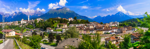 Breathtaking panorama of beautiful Belluno town surrounded by Dolomite mountains, northern Italy © Freesurf