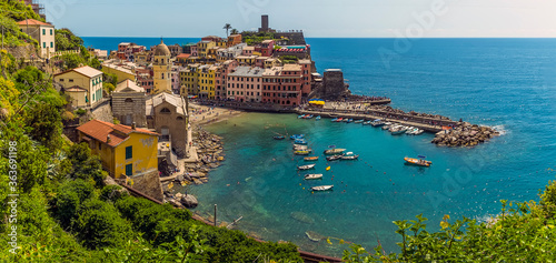 A view over the picturesque village and harbour of Vernazza in the summertime