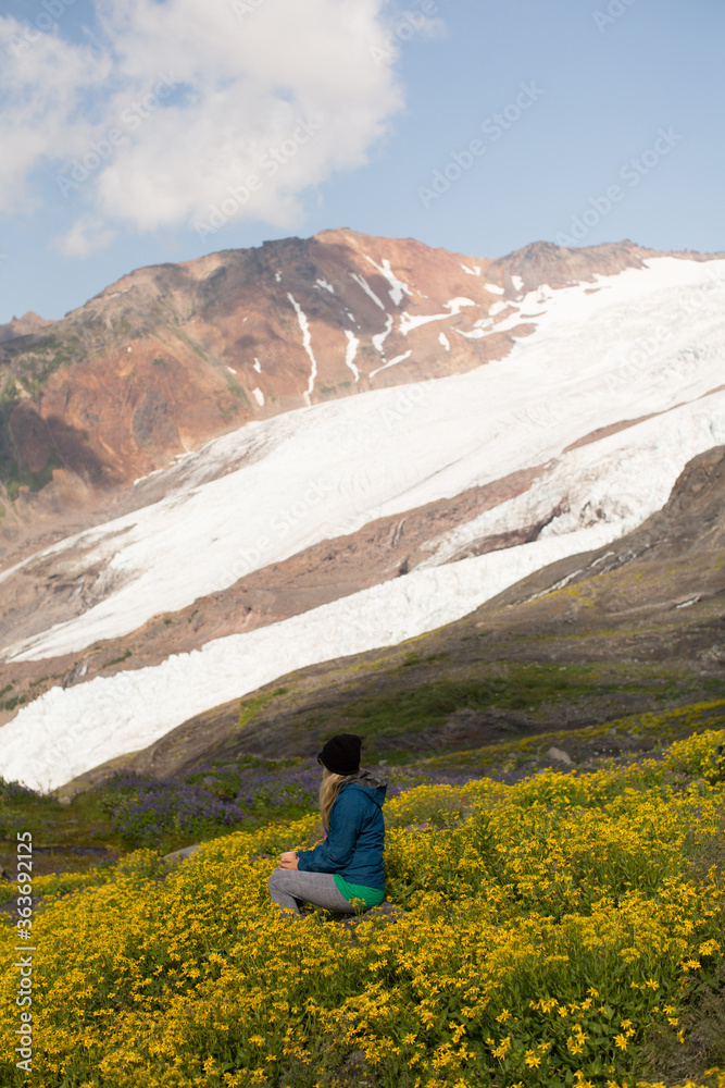 hiker in the mountains sitting down  at Mount Baker-Snoqualmie National Forest