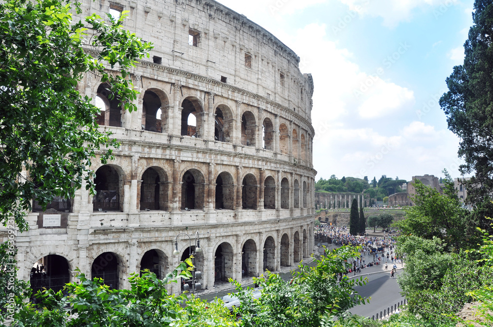 Travel to Italy, Rome - The Colosseum or Coliseum also known as the Flavian Amphitheatre or Colosseo. Long queues of tourist is lining up outside the famous building.