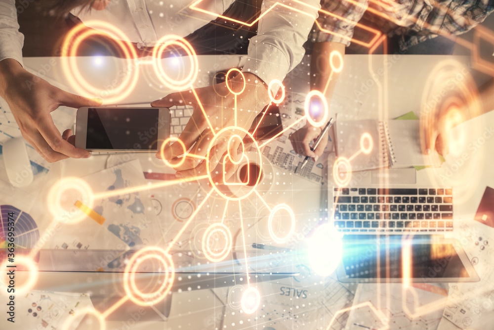 Double exposure of man and woman working together and social network theme hologram drawing. Computer background. connecting concept. Top View. Double exposure of man and woman working together and social network theme hologram drawing. Computer background. connecting concept. Top View.