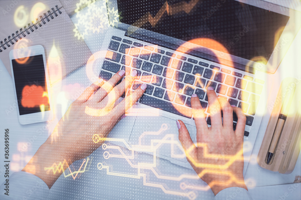 Double exposure of woman hands working on computer and SEO hologram drawing. Top View. Search optimization concept. Double exposure of woman hands working on computer and SEO hologram drawing. Top View. Search optimization concept.