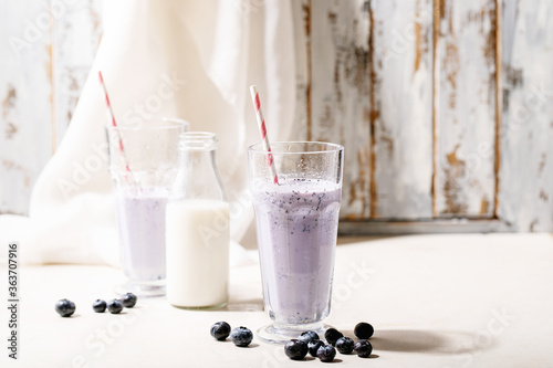 Blueberry milk shake served with fresh blueberries