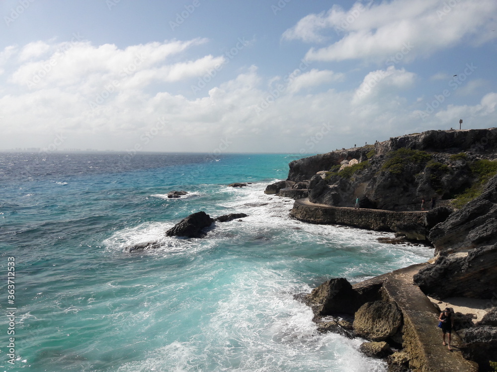 Isla Mujeres South Point Cancun Mexico rocky shore blue water and crashing waves 2020 Isla Mujeres South Point Cancun Mexico rocky shore blue water and crashing waves 2020