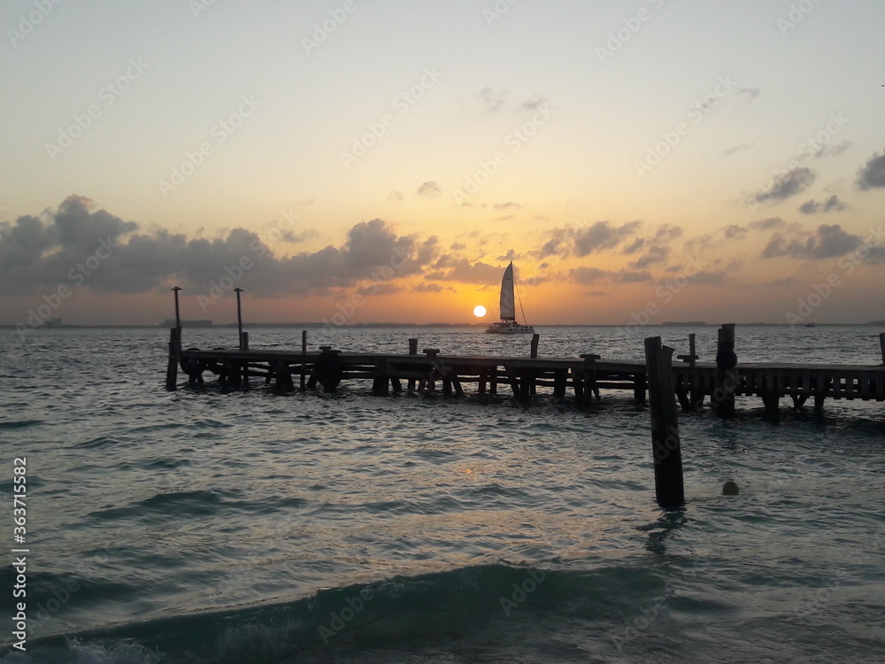 Sunset at beach with a dock on Isla Mujeres Cancun Mexico 2020