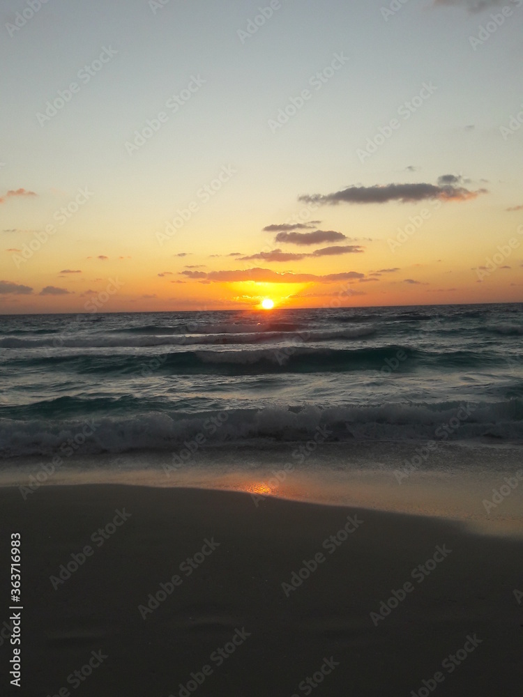 Sunrise over the beach and ocean in Cancun Mexico 2019