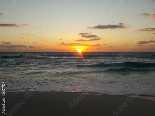 Sunrise over the beach and ocean in Cancun Mexico 2019