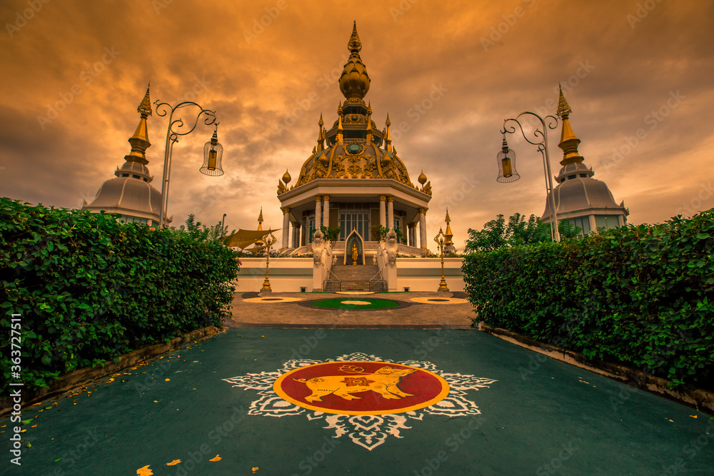 Naklejka premium The background of an important tourist attraction in Khon Kaen Province (Wat Thung Setthi) is a large pagoda in the middle of a swamp, tourists always come to see the beauty in Thailand.