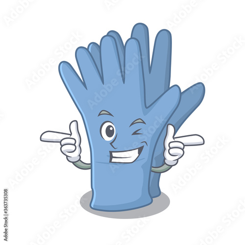 Cartoon design of medical gloves showing funny face with wink eye