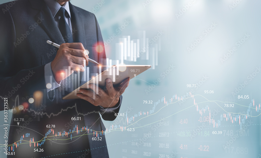 Finance analyst businessman analyzing stock market trend with forex graph on virtual screen - obrazy, fototapety, plakaty 