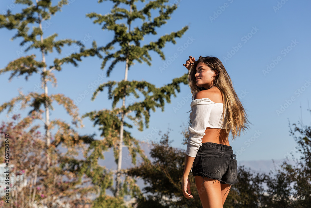 free beautiful young caucasian woman enjoying nature while walking and playing outdoors free beautiful young caucasian woman enjoying nature while walking and playing outdoors
