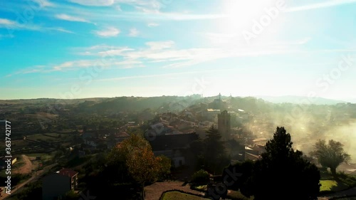 Castle of Fermoselle, rural village in evening, surrounded by fog. Zamora,Spain photo