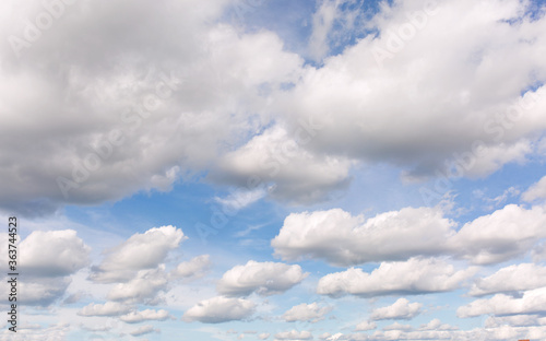 Fototapeta Naklejka Na Ścianę i Meble -  Gray clouds on blue sky background.