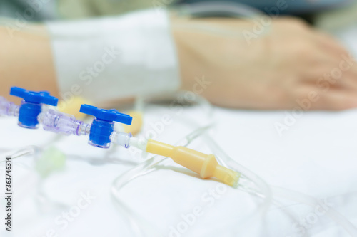 Close up of a woman patient in hospital with saline intravenous