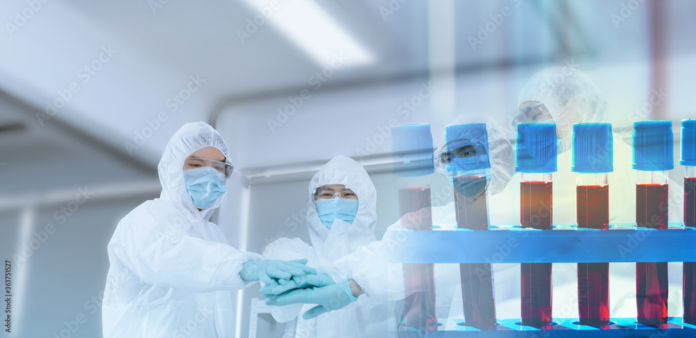 Fototapeta premium Chemists join hands in the hope that Successfully developed blood diagnosis Internal laboratory examination Modern medical biotechnology