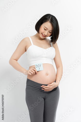 Pregnant woman with sticker