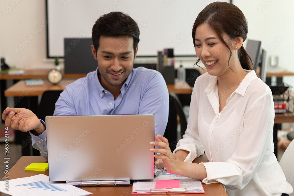 Asian business man and women meeting and talk about job in office. Asian business man and women meeting and talk about job in office.