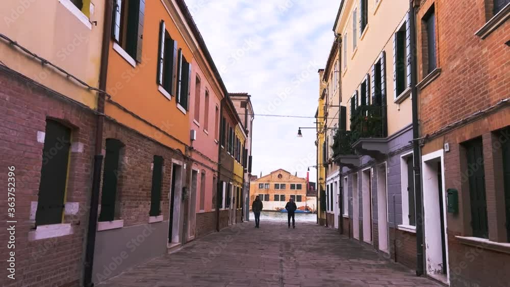 Walking Through Old But Colorful Murano Flats In Venice Italy - push in shot Walking Through Old But Colorful Murano Flats In Venice Italy - push in shot