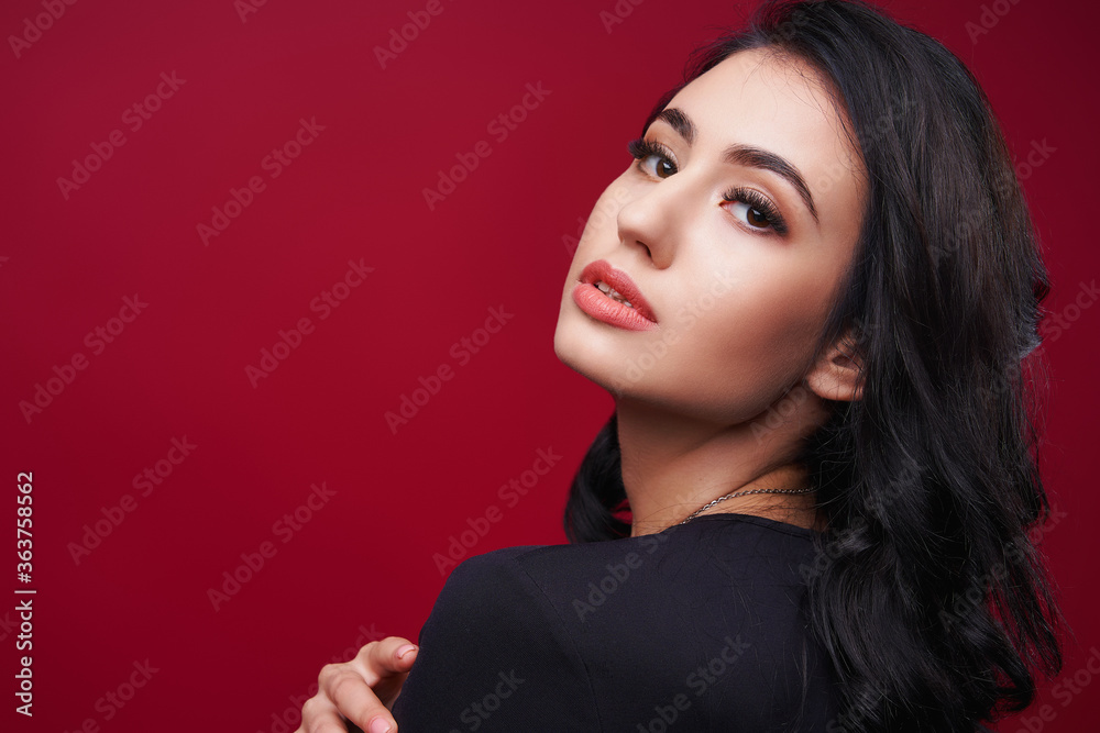 Portrait of an attractive, sensual woman with evening makeup Portrait of an attractive, sensual woman with evening makeup