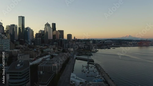 Birds Eye View of Downtown Seattle from Elliott Bay during Sunrise with Mount Rainier in the Distance, Summer photo