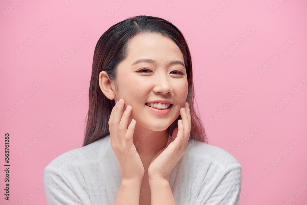 Beautiful Asian young woman touching soft cheek smile with clean and fresh skin Happiness and cheerful with positive emotiona Beautiful Asian young woman touching soft cheek smile with clean and fresh skin Happiness and cheerful with positive emotiona