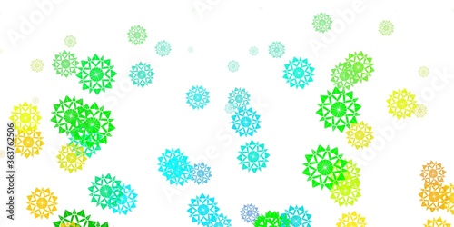 Light blue, yellow vector beautiful snowflakes backdrop with flowers.